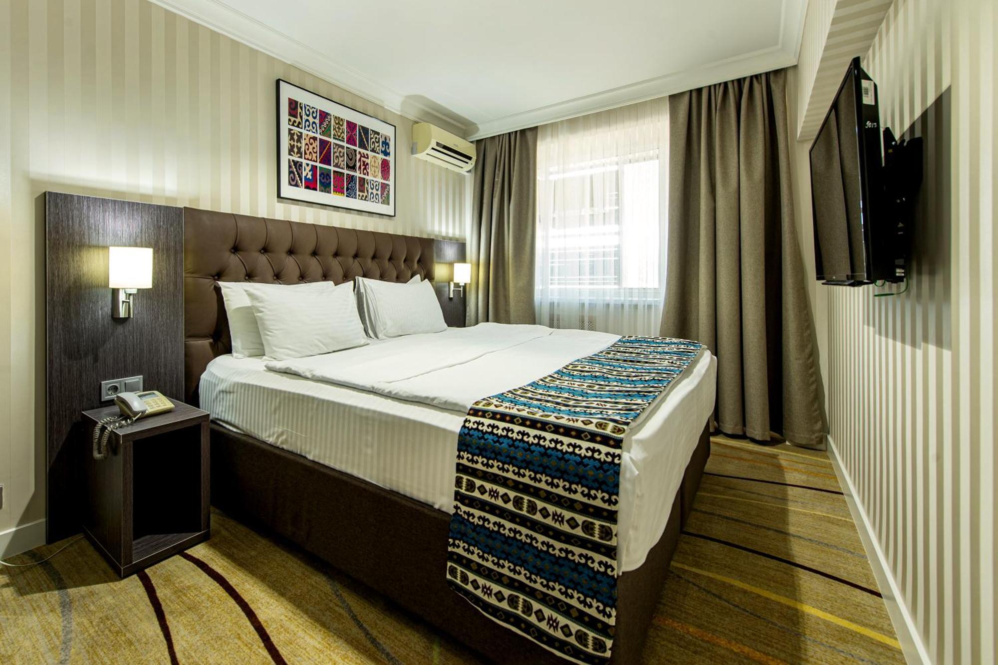 Shymkent Grand Hotel Esterno foto